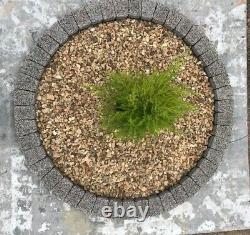 Dark gray water garden feature granite circle fountain base slab