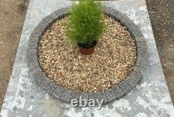 Dark gray water garden feature granite circle fountain base slab