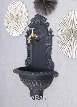 Garden decoration in antique style wall fountain with brass tap water dispenser