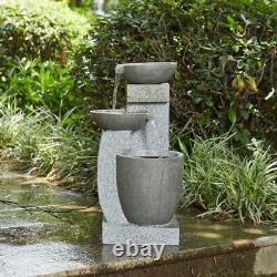 Harmonia garden water fountain comprising tiered cascade waterfall into contempo