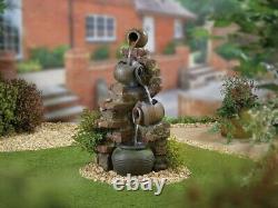 Water Feature Fountain Flowing Jugs inc LEDS Self-contained Pump Included
