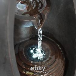 Caractéristique d'eau ovale en cascade avec lumières LED parfaite pour la sérénité du jardin