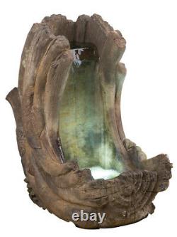 Curving Log Fountain Inc Light Relic Unique Water Feature Par Henri Studio