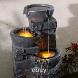 Fontaine à eau à LED avec 3 niveaux de bols Teamson Home, caractéristique de jardin en gris foncé avec cascade.
