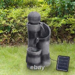 Fontaine à eau en forme de boule noire avec éclairage, alimentée par énergie solaire, pour patio de jardin extérieur.