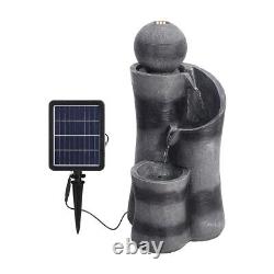 Fontaine à eau en forme de boule noire avec éclairage, alimentée par énergie solaire, pour patio de jardin extérieur.