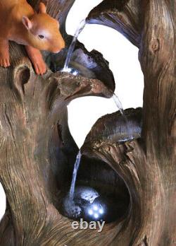 Fontaine cascade de caractère naturel en bois d'effet jardin pour arbre écureuil