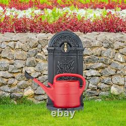 Fontaine d'eau antique debout dans le jardin, ornement de terrasse vintage, robinet debout