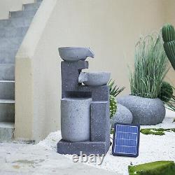 Fontaine d'eau avec éclairage LED de jardin surélevé en marbre avec cascade de bols en cascade.