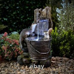 Fontaine de jardin autonome LED de 55 cm avec caractéristiques aquatiques d'otaries jouant en toute sérénité