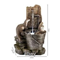 Fontaine de jardin autonome LED de 55 cm avec caractéristiques aquatiques d'otaries jouant en toute sérénité