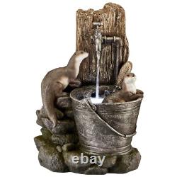 Fontaine de jardin autonome LED de 55 cm avec caractéristiques aquatiques d'otaries jouant en toute sérénité