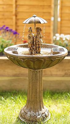 Fontaine de jardin autonome à énergie solaire avec fontaine d'eau et bain d'oiseaux sur pied.