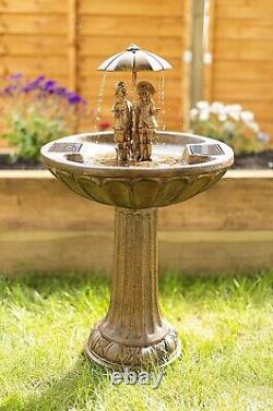 Fontaine de jardin autonome à énergie solaire avec fontaine d'eau et bain d'oiseaux sur pied.