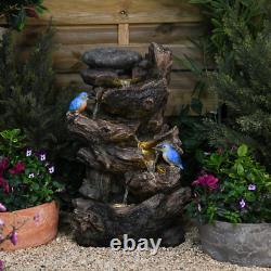 Fontaine de jardin avec éclairage LED en forme de tronc d'arbre Serenity, 63 cm de haut, avec pompe.