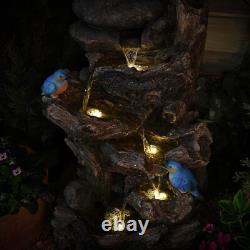 Fontaine de jardin avec éclairage LED en forme de tronc d'arbre Serenity, 63 cm de haut, avec pompe.