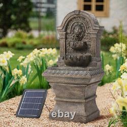 Fontaine de jardin avec statues de lion en pierre, chute d'eau alimentée par énergie solaire