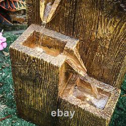 Fontaine en cascade à effet bois solaire avec lumières LED, statues de jardin et décorations de fontaine d'eau