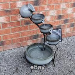 Fontaine extérieure solaire à cascade d'eau pour jardin, caractéristique à plusieurs niveaux pour patio et maison.