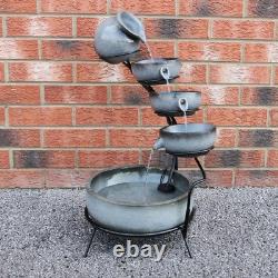 Fontaine extérieure solaire à cascade d'eau pour jardin, caractéristique à plusieurs niveaux pour patio et maison.