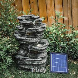 Fontaine solaire de jardin en plein air avec chute de rochers, LED et cascade d'eau au Royaume-Uni.