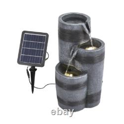 Jardin avec fontaines extérieures à caractéristiques aquatiques, alimentées par énergie solaire et éclairées par des LED avec un bol en cascade.